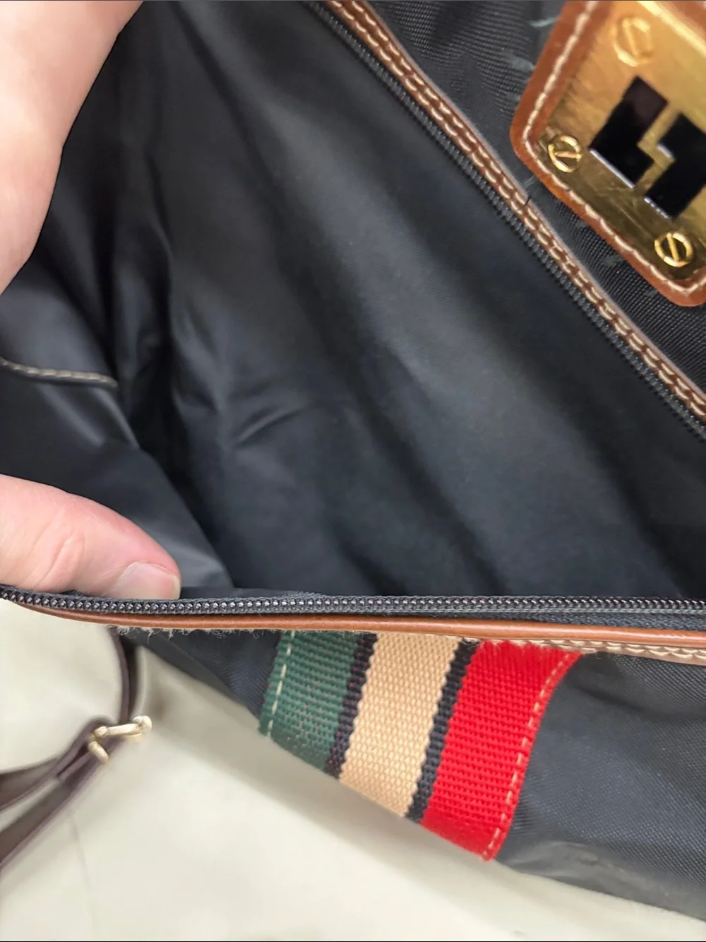 Leisure Black Travel Duffel Bag with Brown Trim and Stripe Accent